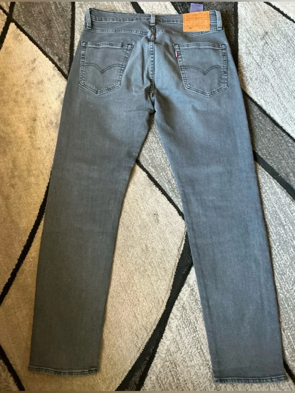 Size 34 x 32 - Levi & Strauss Levis 502 Taper Gray Wash Irregular Denim Jeans